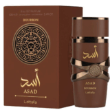Frasco de perfume Asad de Lattafa, con diseño elegante en tonos marrones y dorados, acompañado de su caja decorativa, ideal para hombres que buscan una fragancia distintiva y sofisticada.