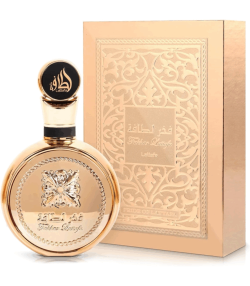 Botella de perfume elegante con diseño dorado y caja decorativa, ideal para regalo o uso personal.