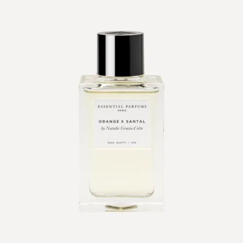 Essential Parfums Orange X Santal 100ml - Frasco Frasco de Essential Parfums Orange X Santal 100 ml sobre fondo crema.