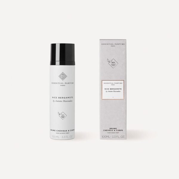 Botella de spray facial con diseño elegante, acompañada de su caja, ideal para la hidratación y cuidado de la piel.